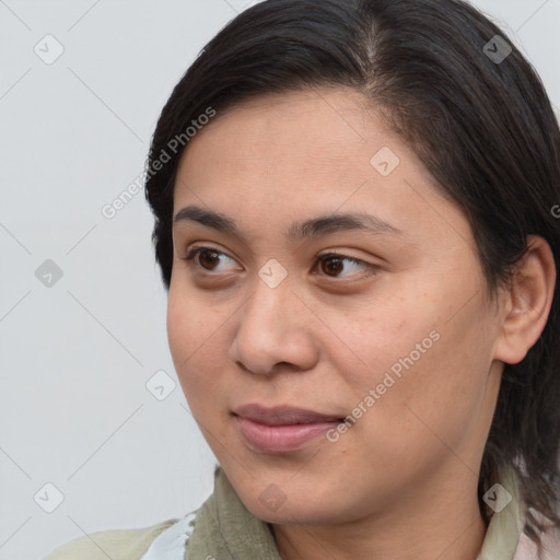 Joyful white young-adult female with medium  brown hair and brown eyes