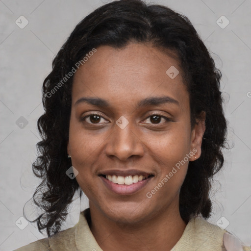 Joyful black young-adult female with medium  brown hair and brown eyes