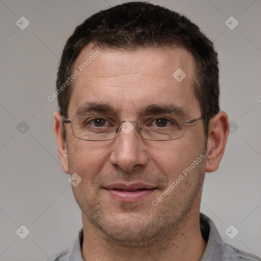 Joyful white adult male with short  brown hair and brown eyes