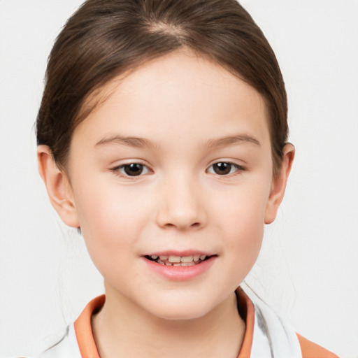 Joyful white child female with short  brown hair and brown eyes