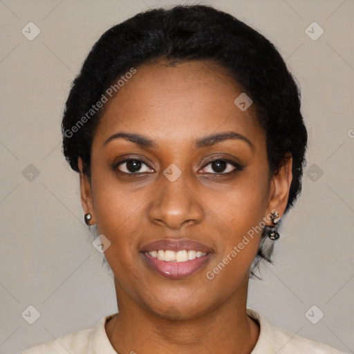 Joyful black young-adult female with short  black hair and brown eyes