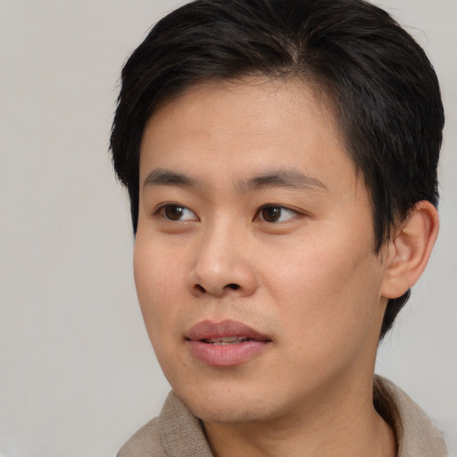 Neutral asian young-adult male with short  black hair and brown eyes