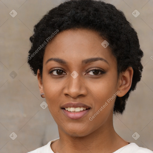 Joyful black young-adult female with short  black hair and brown eyes