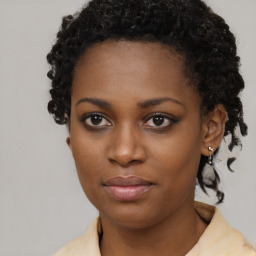 Neutral black young-adult female with short  brown hair and brown eyes