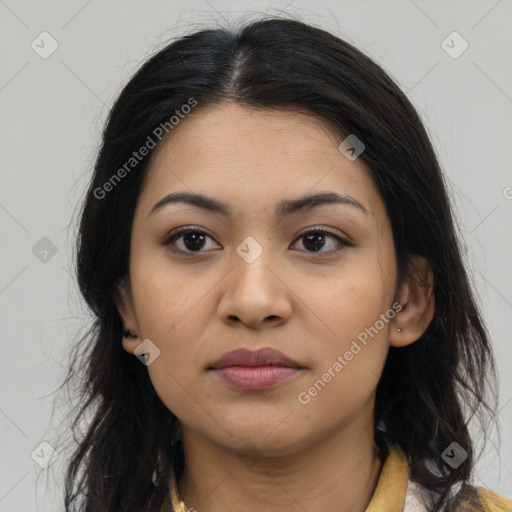 Joyful latino young-adult female with long  brown hair and brown eyes