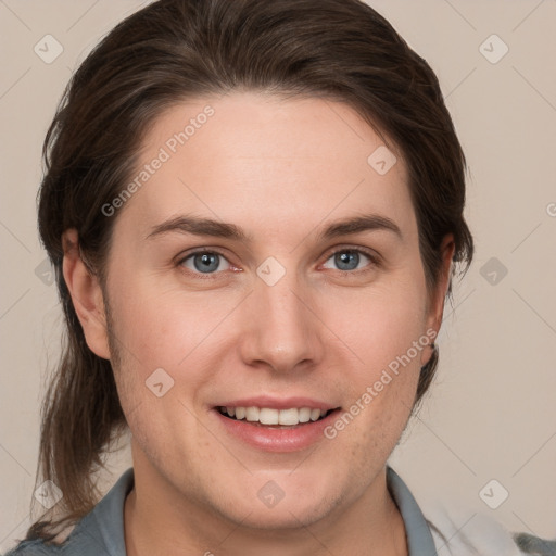 Joyful white young-adult female with medium  brown hair and grey eyes