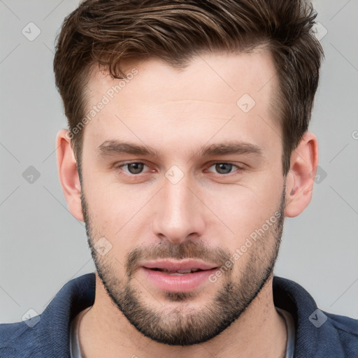 Neutral white young-adult male with short  brown hair and grey eyes