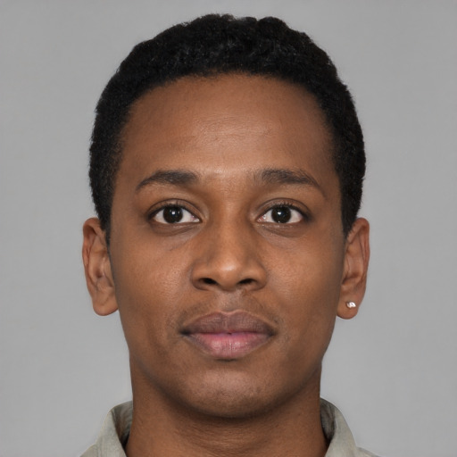 Neutral black young-adult male with short  black hair and brown eyes