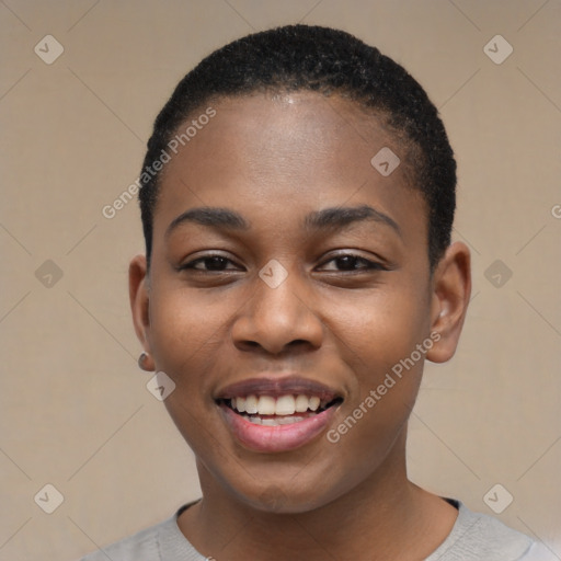 Joyful black young-adult female with short  black hair and brown eyes