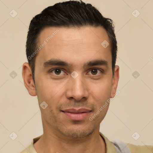 Joyful white young-adult male with short  black hair and brown eyes