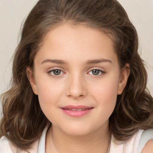 Joyful white child female with medium  brown hair and brown eyes