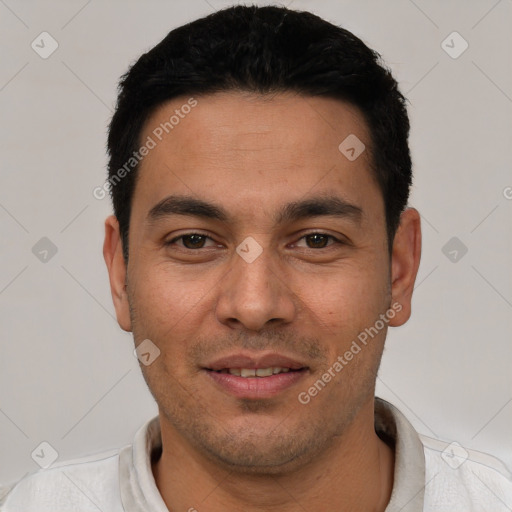 Joyful white young-adult male with short  black hair and brown eyes