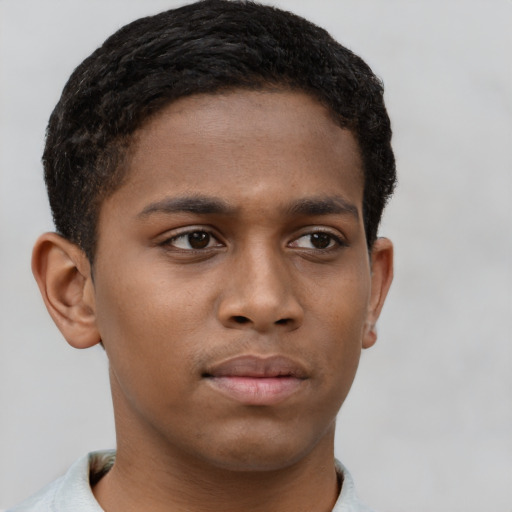 Neutral black young-adult male with short  brown hair and brown eyes