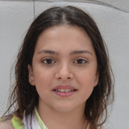 Joyful white child female with medium  brown hair and brown eyes