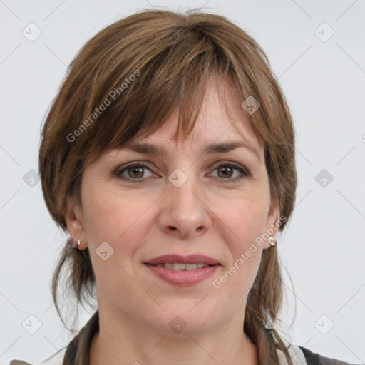 Joyful white adult female with medium  brown hair and grey eyes