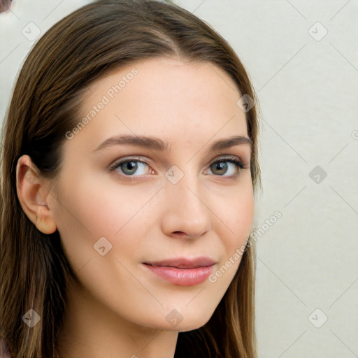 Joyful white young-adult female with long  brown hair and blue eyes