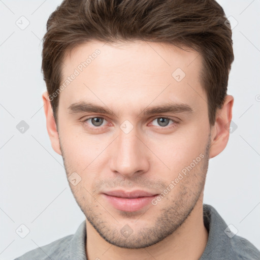 Neutral white young-adult male with short  brown hair and grey eyes