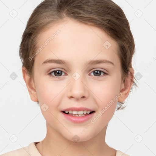 Joyful white child female with short  brown hair and brown eyes