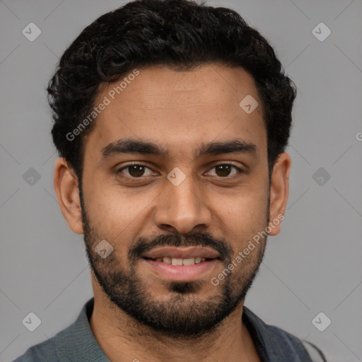 Joyful latino young-adult male with short  black hair and brown eyes