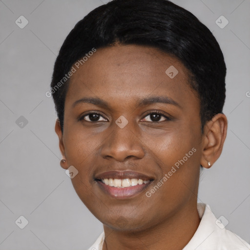 Joyful black young-adult female with short  black hair and brown eyes