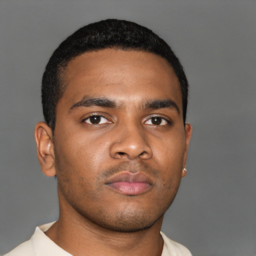 Neutral black young-adult male with short  brown hair and brown eyes