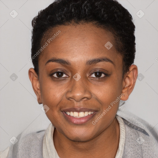 Joyful black young-adult female with short  brown hair and brown eyes