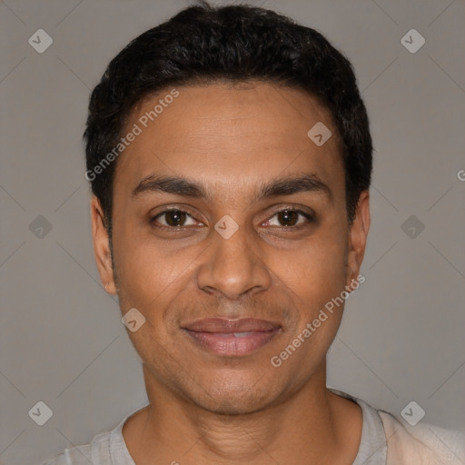 Joyful latino young-adult male with short  black hair and brown eyes