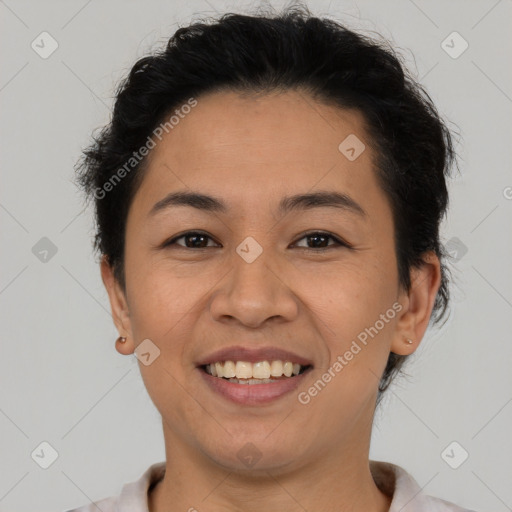 Joyful asian young-adult female with short  brown hair and brown eyes