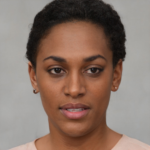 Neutral black young-adult female with short  brown hair and brown eyes