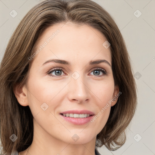 Joyful white young-adult female with medium  brown hair and green eyes