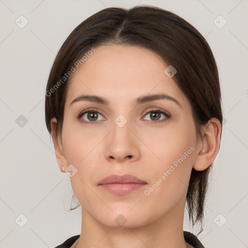 Neutral white young-adult female with medium  brown hair and brown eyes