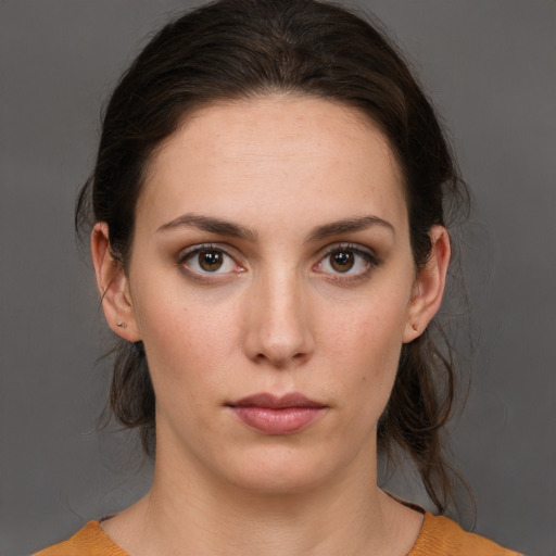 Neutral white young-adult female with medium  brown hair and brown eyes