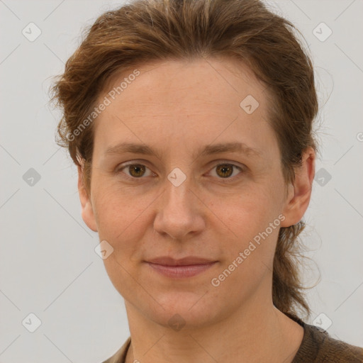 Joyful white adult female with short  brown hair and brown eyes