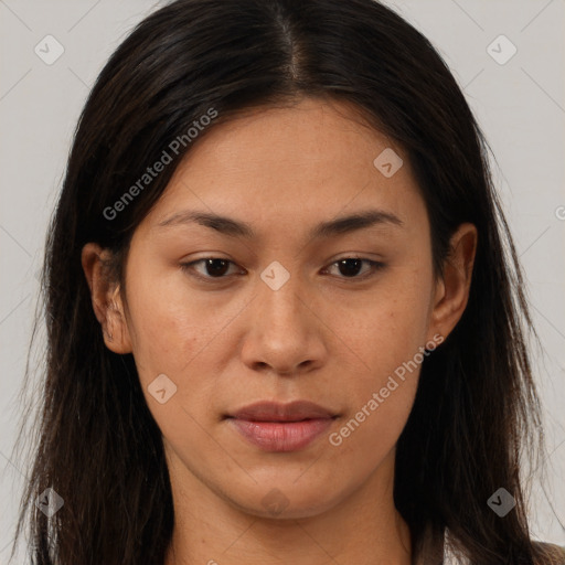 Joyful asian young-adult female with long  brown hair and brown eyes