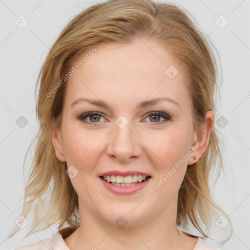 Joyful white young-adult female with medium  brown hair and blue eyes