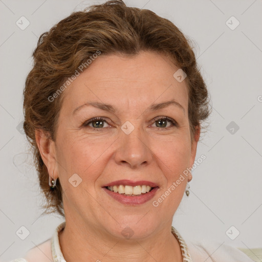 Joyful white adult female with short  brown hair and brown eyes