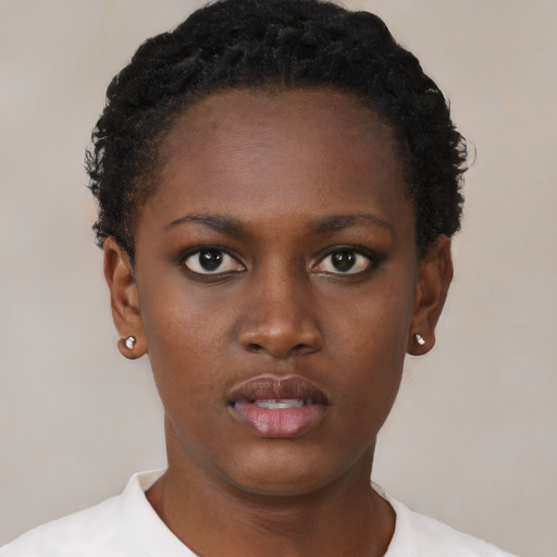 Neutral black young-adult female with short  black hair and brown eyes