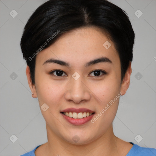 Joyful asian young-adult female with short  black hair and brown eyes