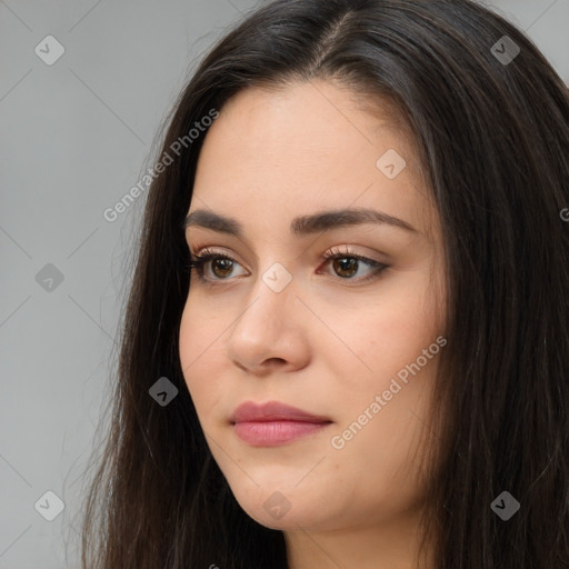 Neutral white young-adult female with long  brown hair and brown eyes