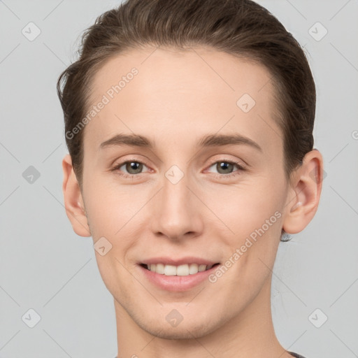 Joyful white young-adult female with short  brown hair and grey eyes