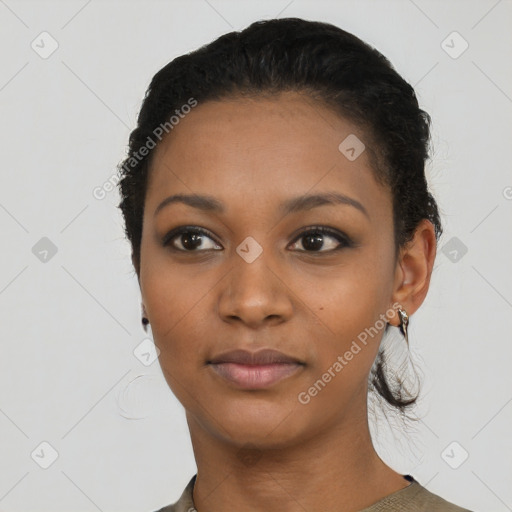 Neutral black young-adult female with short  black hair and brown eyes