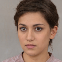 Neutral white young-adult female with medium  brown hair and brown eyes