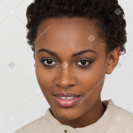 Joyful black young-adult female with short  brown hair and brown eyes