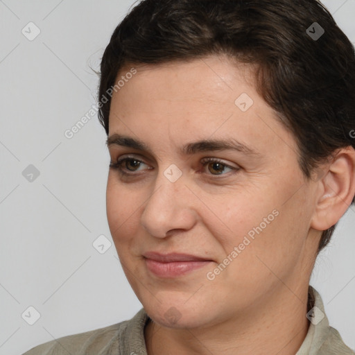 Joyful white adult female with medium  brown hair and brown eyes