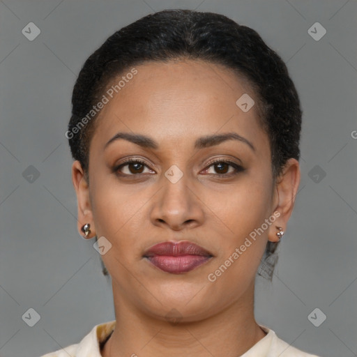 Joyful latino young-adult female with short  brown hair and brown eyes