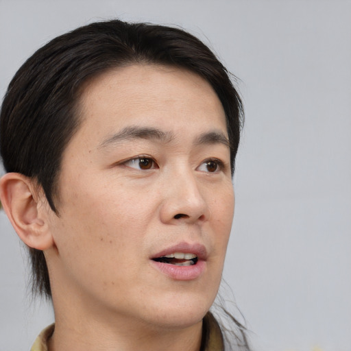 Neutral asian young-adult male with short  black hair and brown eyes