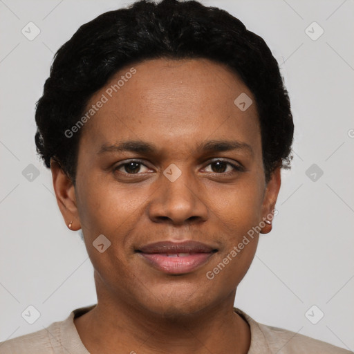 Joyful black young-adult male with short  black hair and brown eyes