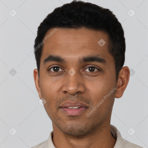 Neutral latino young-adult male with short  black hair and brown eyes