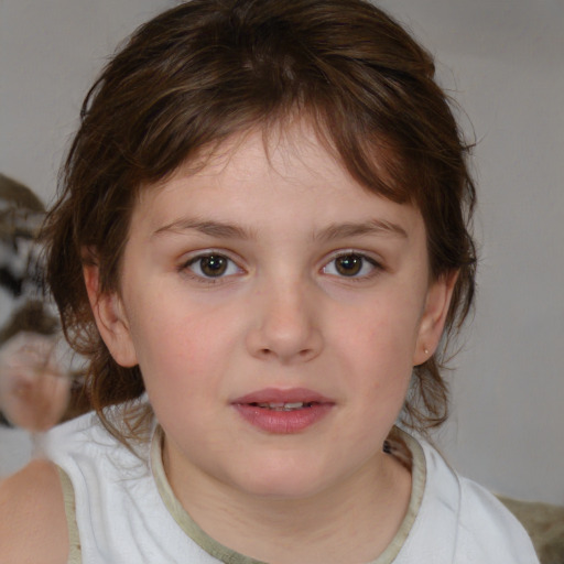 Joyful white child female with medium  brown hair and brown eyes