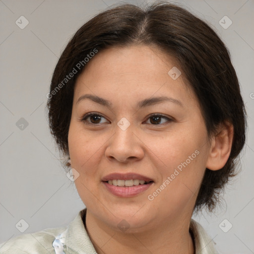 Joyful white adult female with medium  brown hair and brown eyes